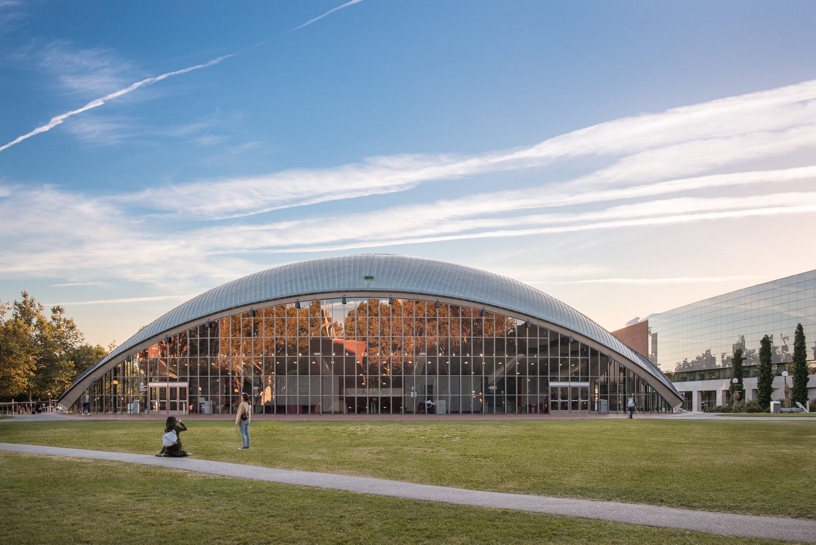 Architectural photography of the Kresge Auditorium at MIT in Boston Massachusetts designed by Eero Saarinen featuring a one point perspective during the golden hour