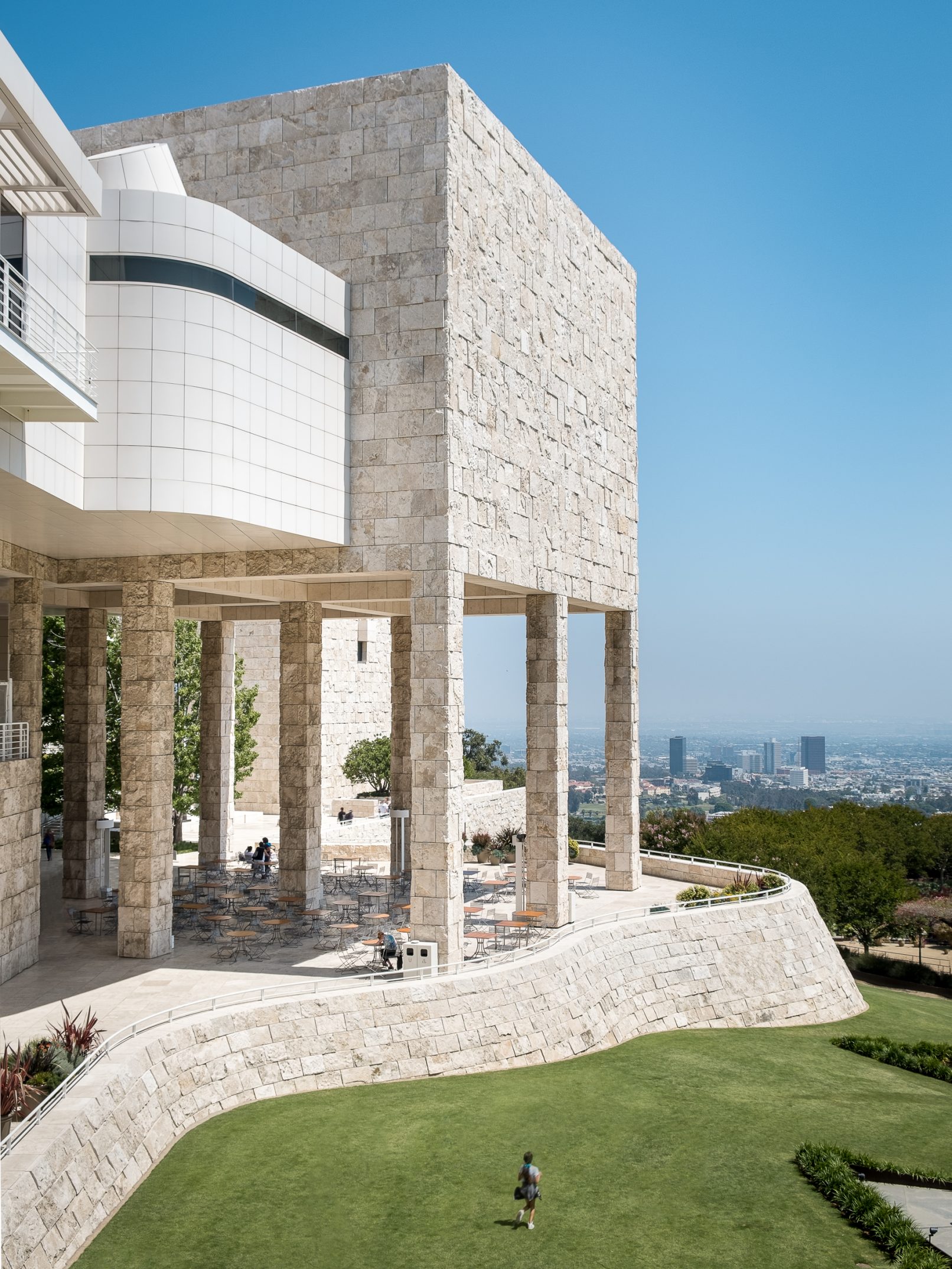 Architectural Photograph of the Getty Center in Los Angeles designed by Richard Meier and Partners featuring a shot of the marble exterior looking out towards Santa Monica